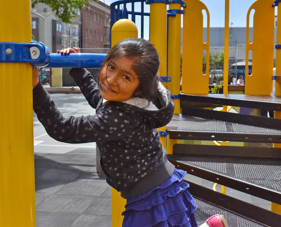 girl playing on playground