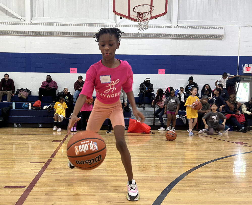 girl playing basketball