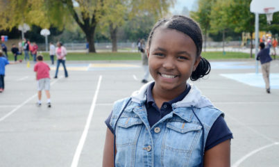 girl smiling at recess